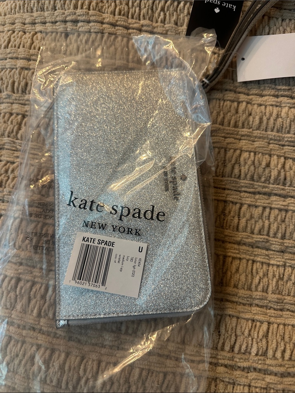 kate spade silver glitter zip-around wristlet phone case